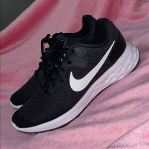 Nike Revolution 6 running shoes. Women's size 8.5. Like New.
